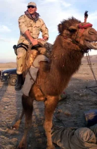 Chief Master Sergeant John M. Harris (Ret.) on camel